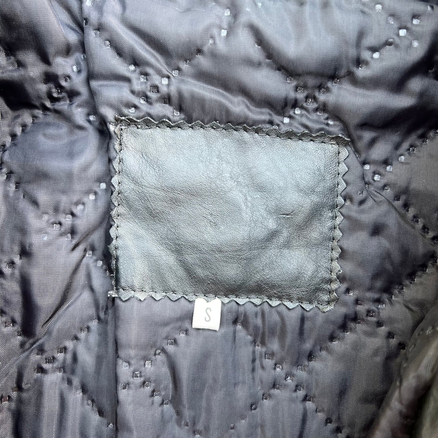 Inside tag, size small