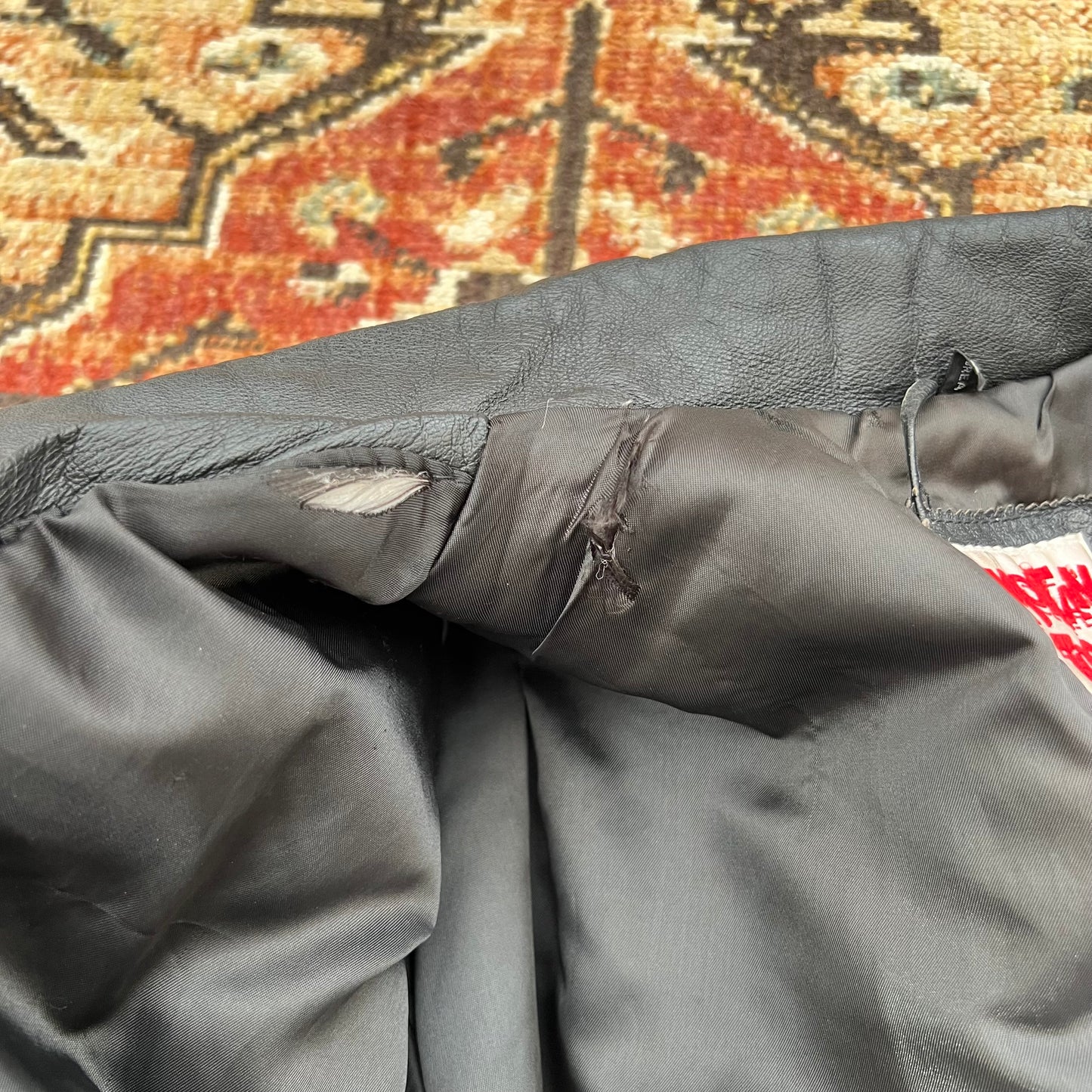 Photo showing the rips inside of jacket