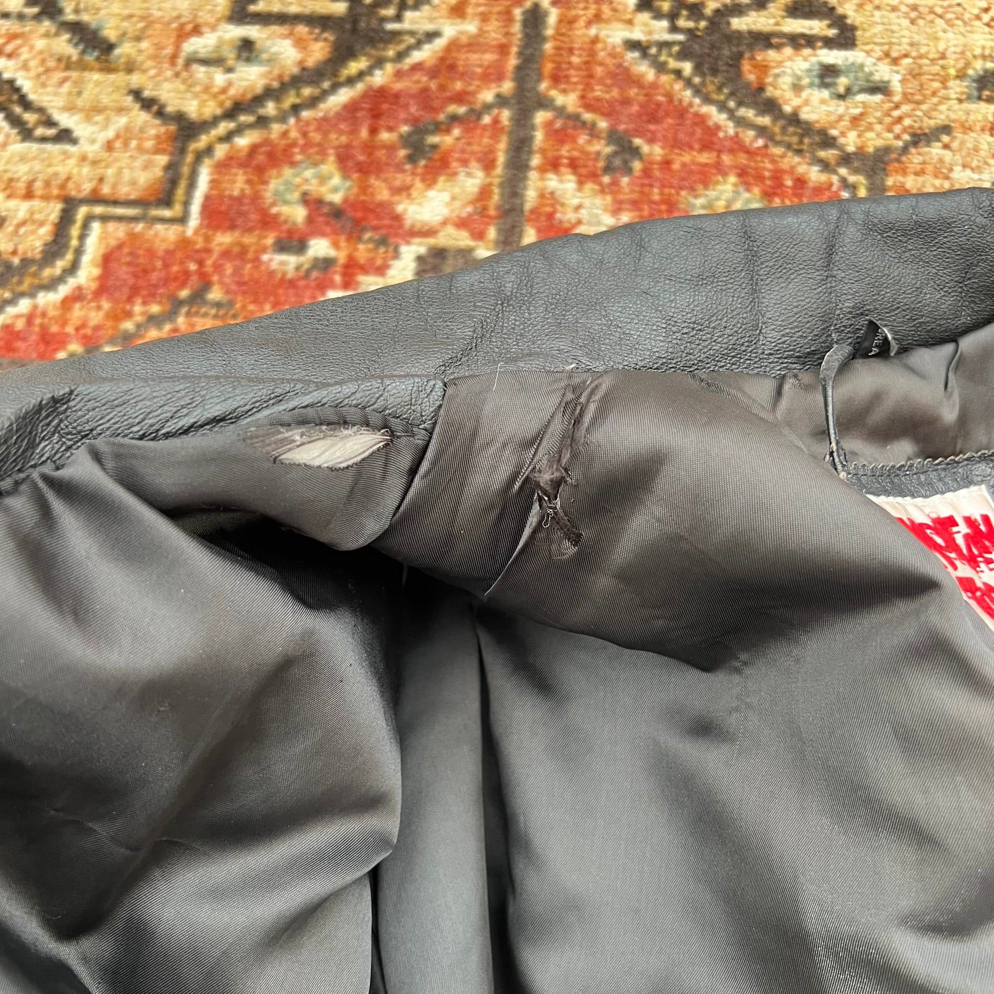 Photo showing the rips inside of jacket